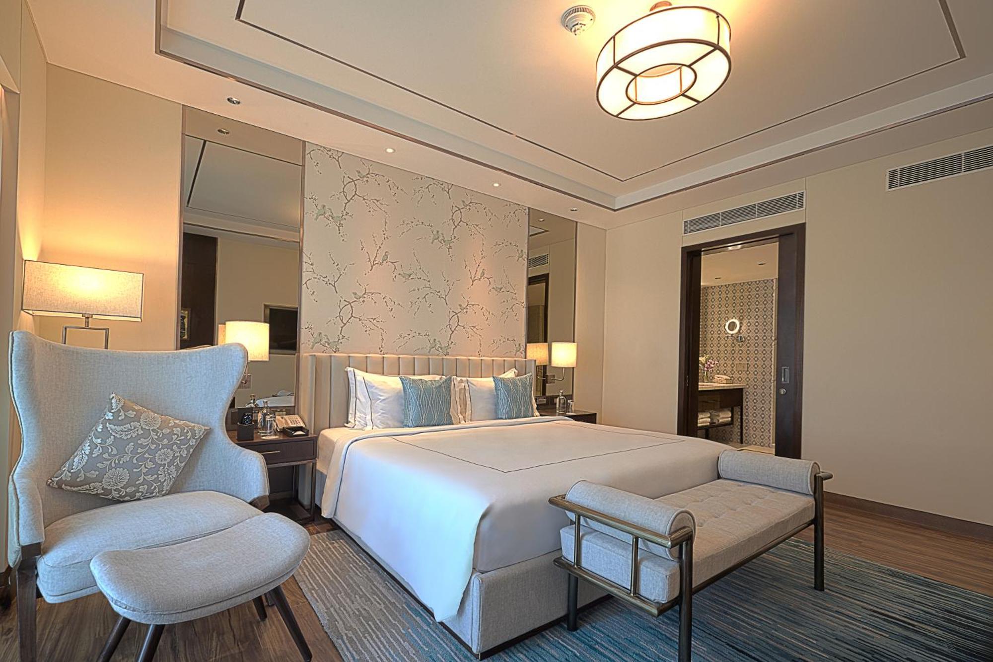 Taj Bangalore Devanahalli Ngoại thất bức ảnh A bedroom at the hotel