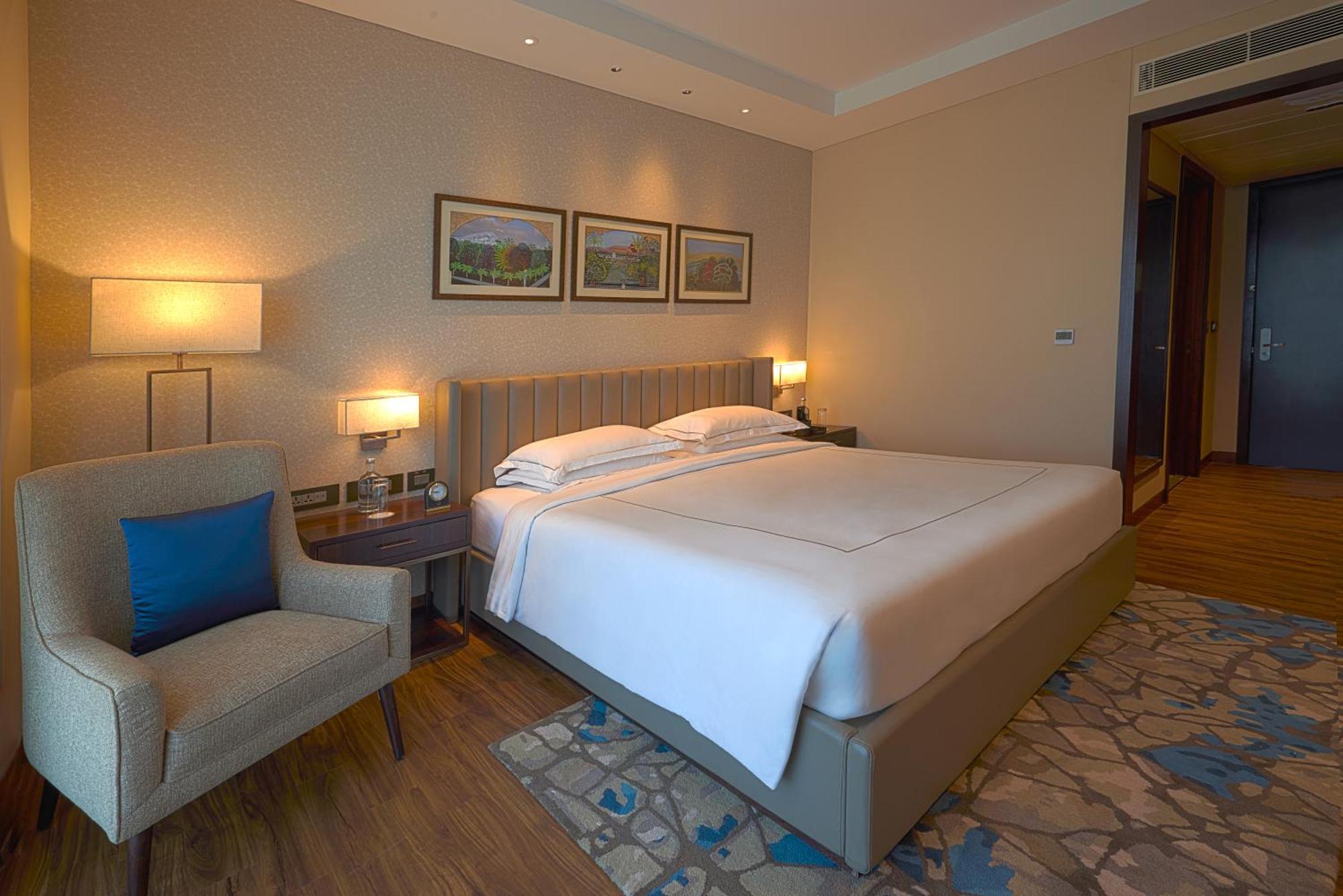 Taj Bangalore Devanahalli Ngoại thất bức ảnh A bedroom at the hotel