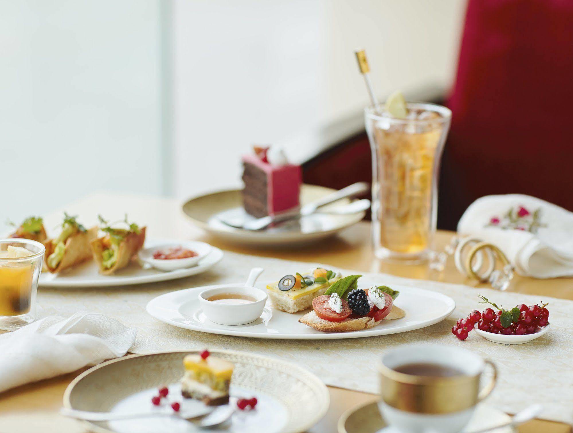 Taj Bangalore Devanahalli Ngoại thất bức ảnh A typical afternoon tea